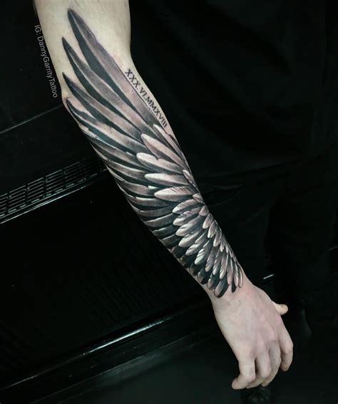 forearm wing tattoo meaning|angel wing forearm tattoo men.